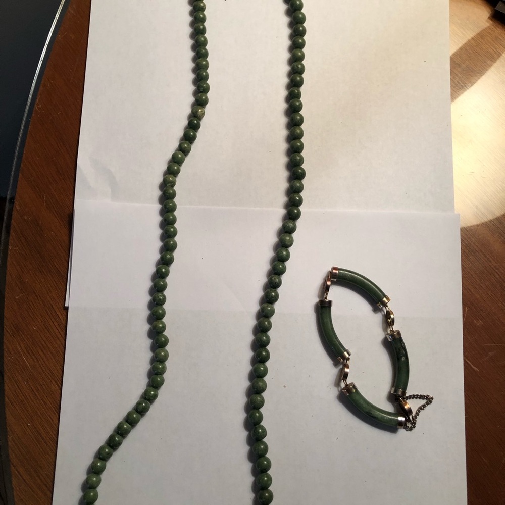 Jade and gold tone necklace